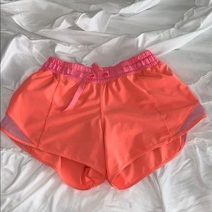 Lulu lemon 2.5” hotly hot shorts neon pink size 4